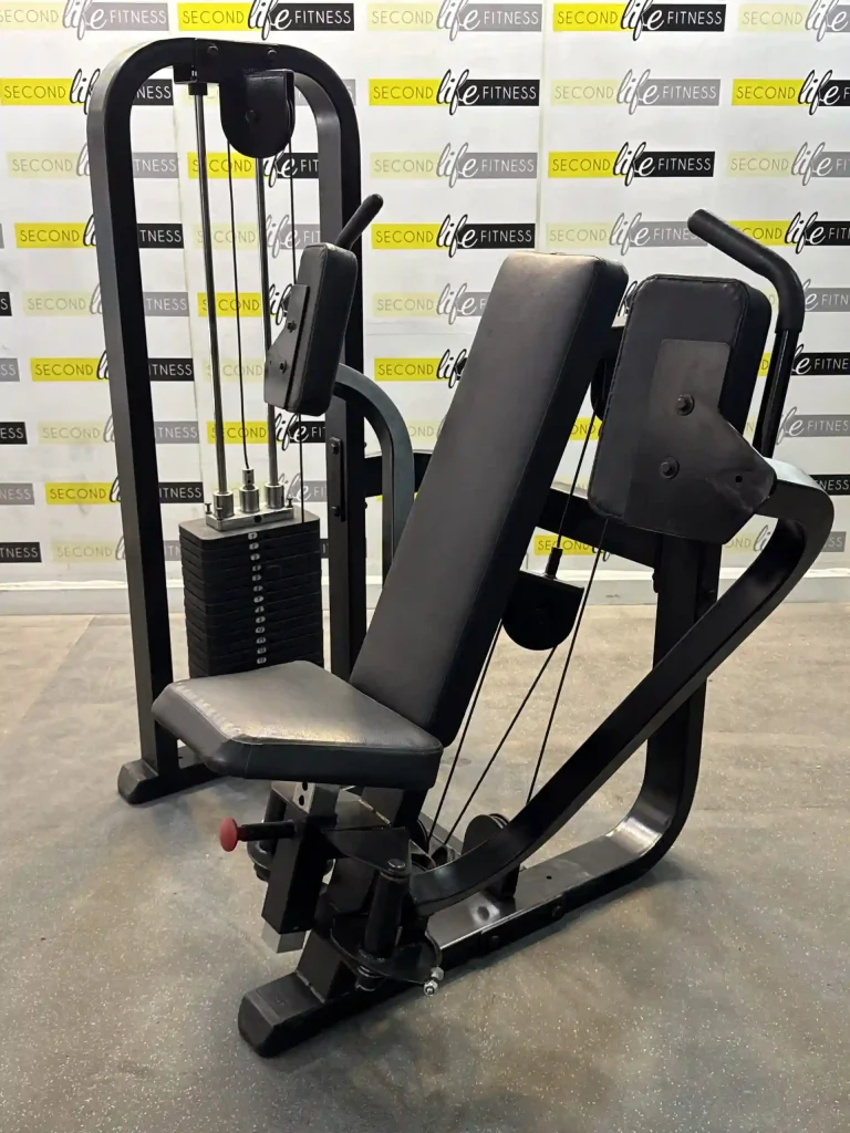 Front view of the Body-Solid Pec Deck & Deltoid Machine set up in a modern Dubai villa home gym, showcasing its independent lever arms, adjustable seat pad, and sealed-bearing pulleys—ideal for chest and shoulder isolation workouts under AED pricing.