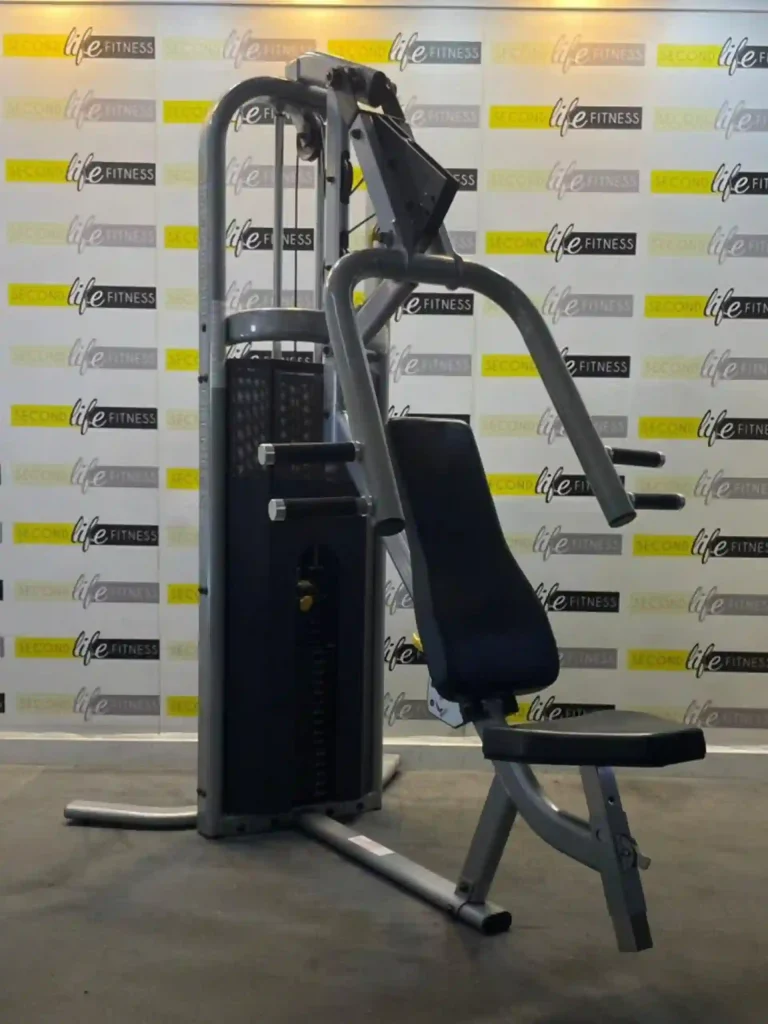 An individual performing an incline press on the Inflight Multi Press, demonstrating the upper chest muscle engagement and the smooth motion of the machine. The backdrop is a modern fitness studio in Sharjah, emphasizing the equipment's effectiveness for targeted muscle development.