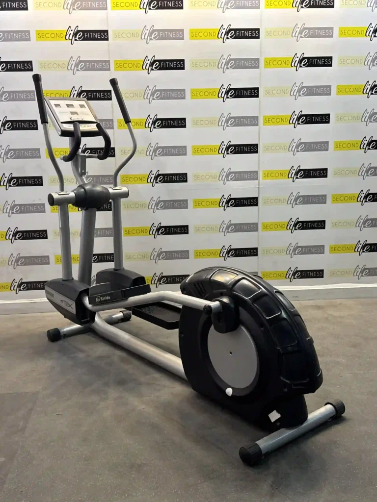 Close-up view of the Precor Open Stride's articulating foot pedals and the Open Stride™ mechanism, showcasing its unique ability to adjust stride length and height in an Abu Dhabi fitness studio. The focus is on the innovative technology that provides a personalized and low-impact workout.